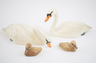 Beswick to include a pair of cygnets, with a pair of swans 1684 and 1685 (4). In good condition with