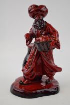 Royal Doulton Flambe figure The Lamp Seller HN3278. In good condition with no obvious damage, on