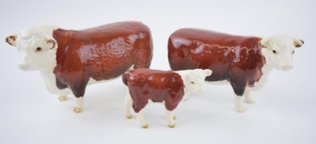 Beswick cattle family to include Hereford Bull, Hereford Cow and Hereford Calf (3). In good