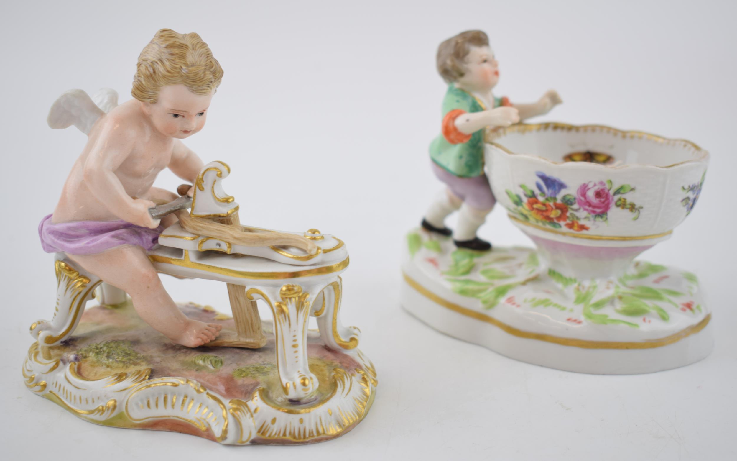 Early 20th century Meissen figure 'Cupid Carving His Bow', 11cm wide, with incised marks, together