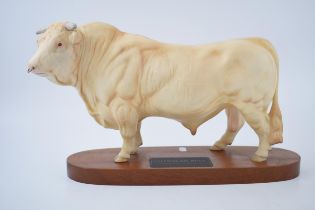 Beswick Charolais Cow on wooden base, Connoisseur series. In good condition with no obvious damage