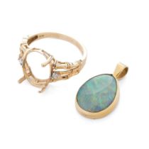 A 9ct gold pendant with opal-style insert together with a 9ct gold ring setting, combine