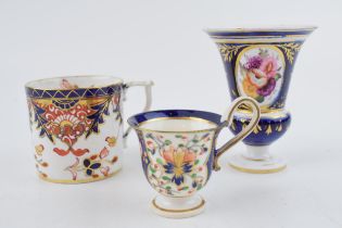 An early 19th century Derby porcelain coffee can and similar style cup and footed vase, c.1810-30.