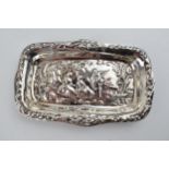 Hallmarked silver heavily embossed pin tray with a romantical scene of a gentleman playing music for