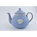 Wedgwood Blue Jasperware teapot with floral relief, ribbed effect. In good condition.