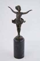 A spelter figure mounted onto a marble base in the form of a ballet dancer, 32cm tall,