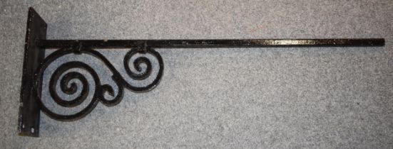 Blacksmith made wrought iron wall-mountable hanger for shop or pub sign. Scroll work to iron with