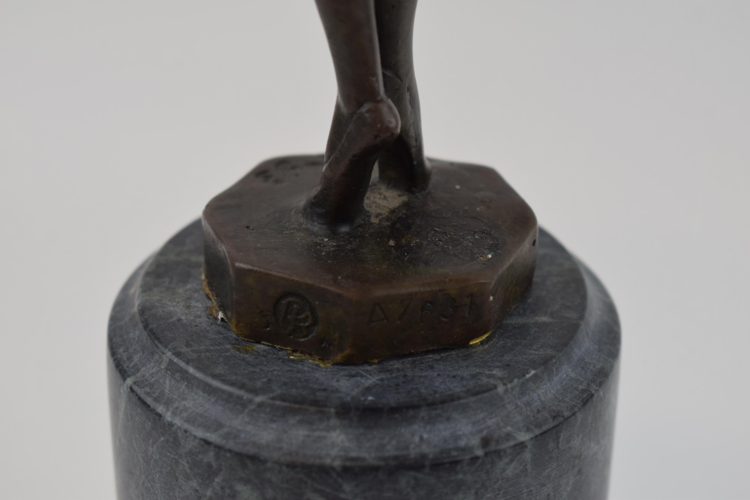 A spelter figure mounted onto a marble base in the form of a girl holding her dress, 32cm tall, - Image 3 of 3