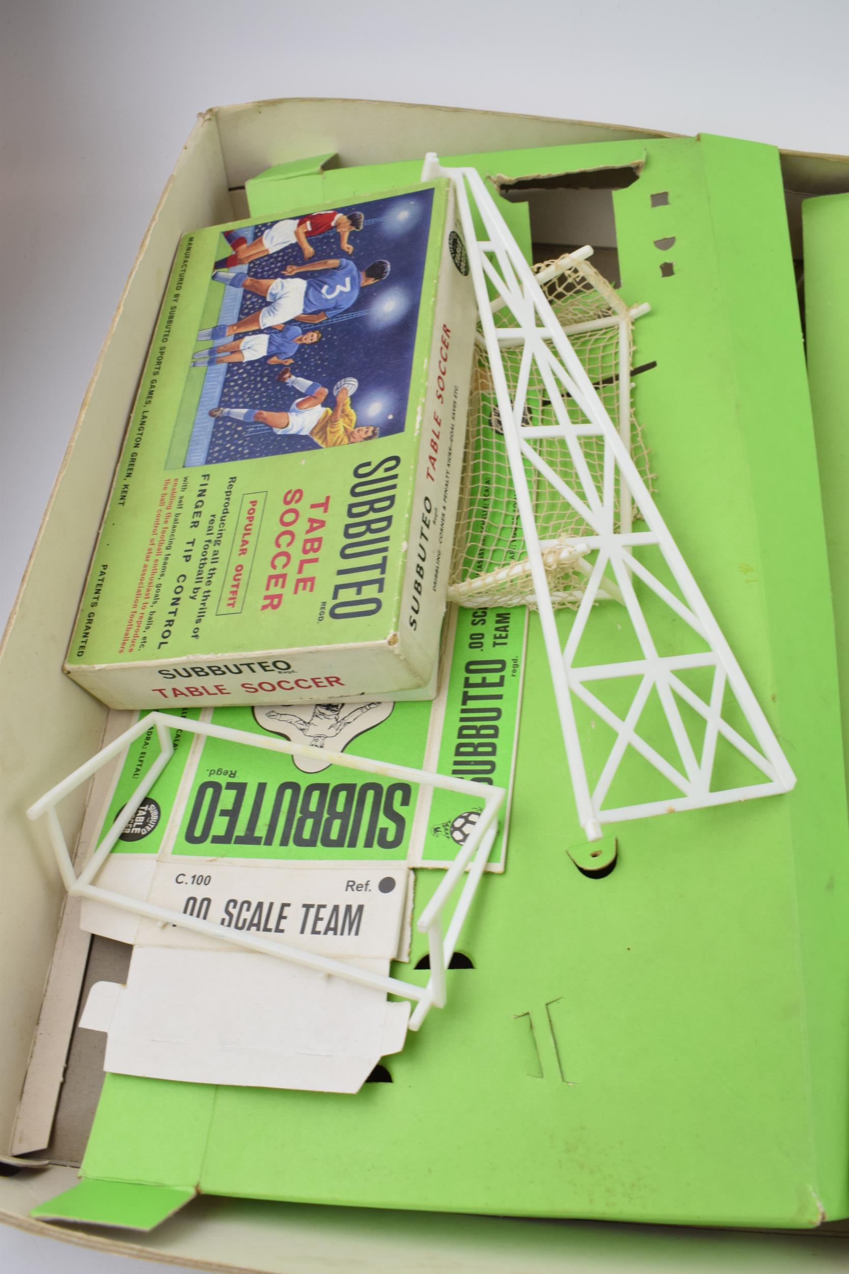 A vintage Subbuteo set with pitch, vintage additional player sets and later flood-lights. a/f. In - Image 3 of 5