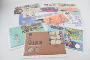 A collection of 11 First Day Covers, with 50p coins, to include World Heritage Sites, For Valour,