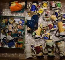 A collection of Toby and character jugs to include a Franklin Mint miniature character jugs (16)