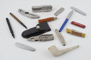 A collection of vintage penknives to include examples by Victorinox, together with a collection of