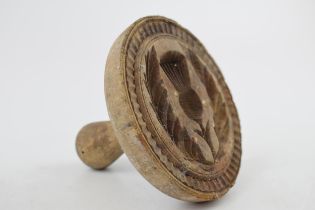 Vintage treen butter stamp with thistle decoration, 12cm diameter. Old worm noted and age related