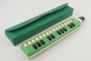 A vintage Horner Melodica Soprano, In original case. Length 35cm. In good original condition.