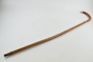 An early 20th century walking cane with silver collar, Birmingham 1918, J Howell & Co, inscription