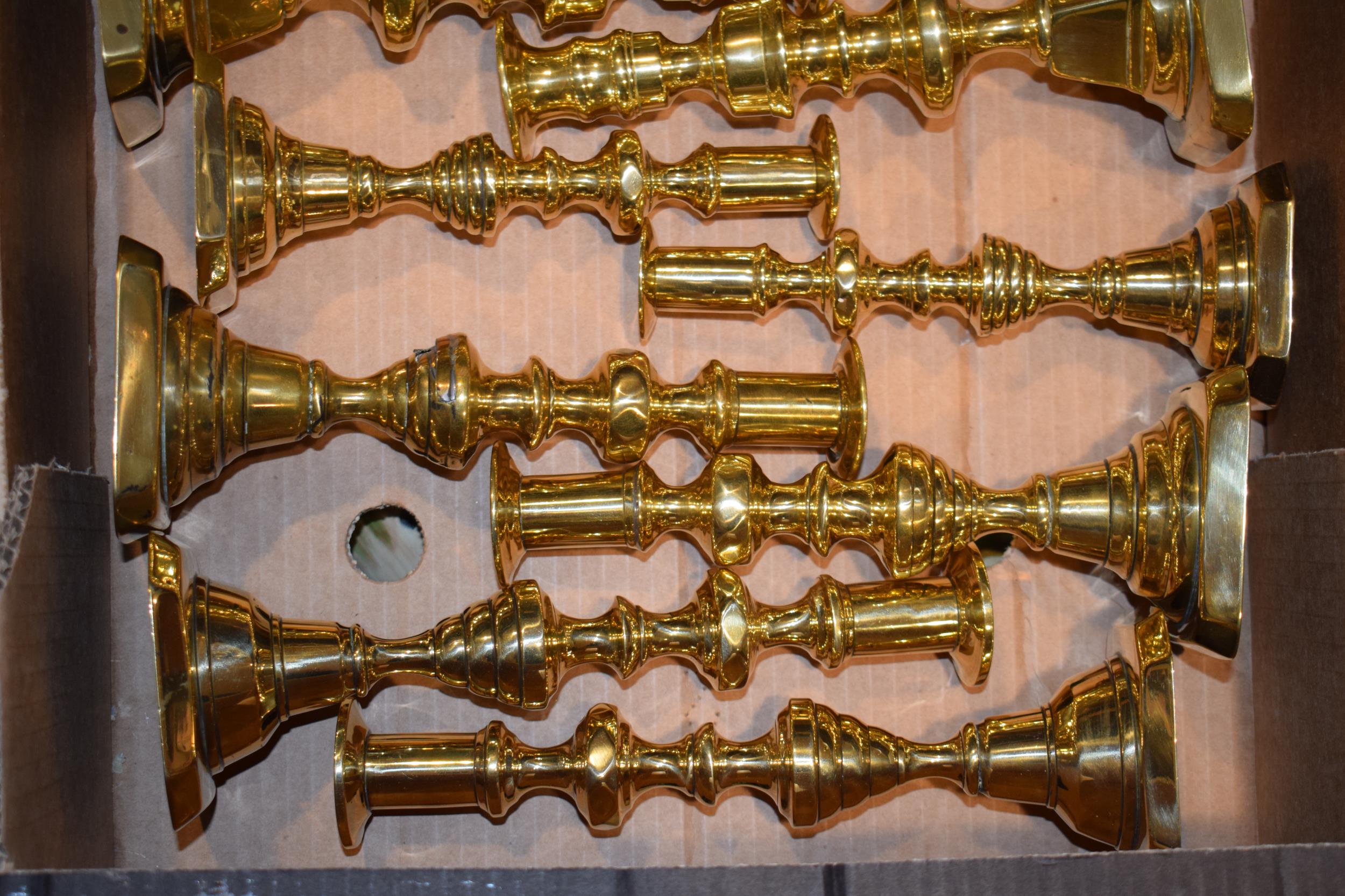 A collection of antique brass candle sticks together with other similar vintage brass items, in - Image 4 of 4