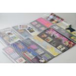 31 x UK presentation packs of stamps, together with additional sets and FDC (First Day Covers)