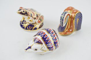 Three Royal Crown Derby Paperweights, Frog, decorated in the Imari palate, gold stopper, a Hedgehog,
