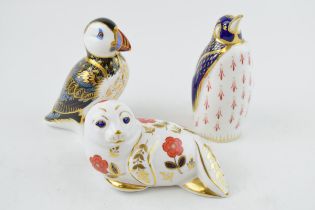 Three Royal Crown Derby paperweights, Puffin, date code for 1998 (LXI), silver stopper and red