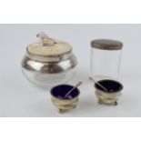 A pair of silver salts, hallmarked Birmingham 1907 / 1908 with matched spoons and Bristol blue glass