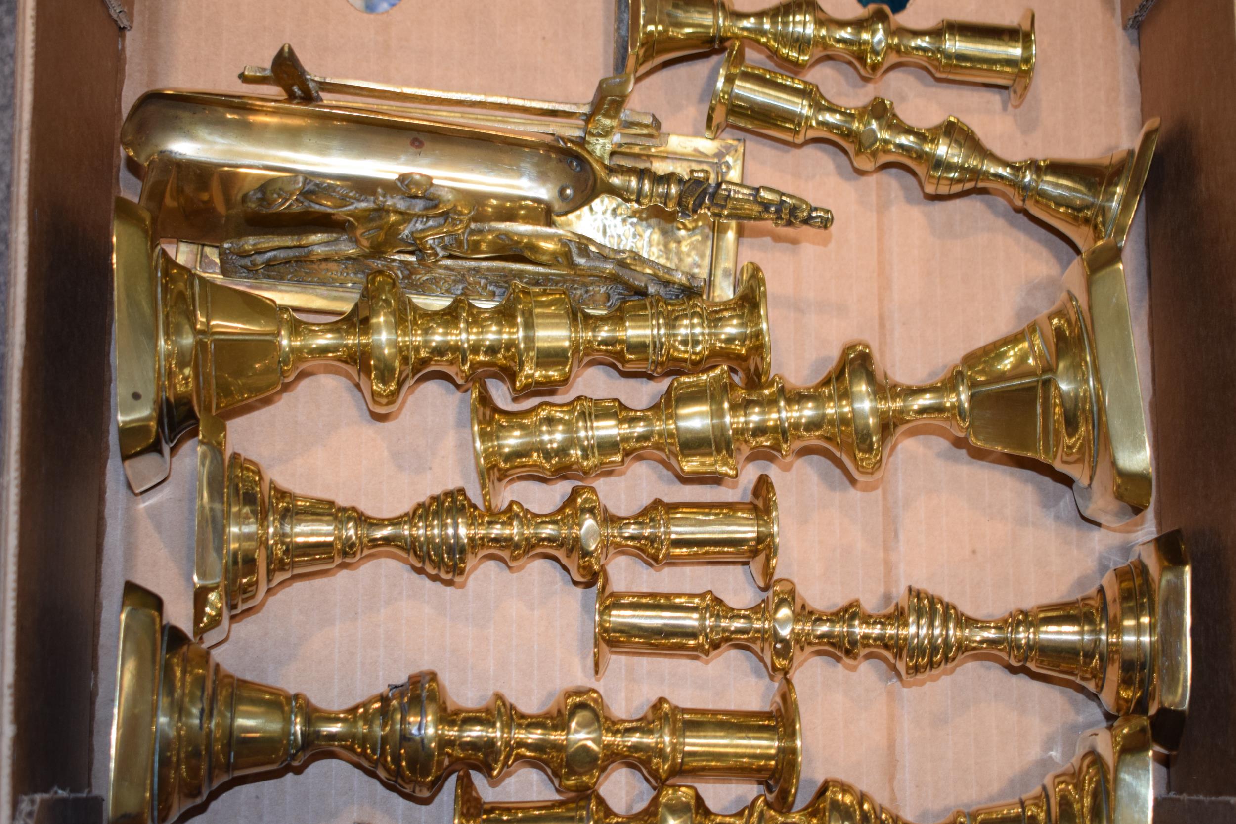 A collection of antique brass candle sticks together with other similar vintage brass items, in - Image 3 of 4