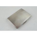 Silver cigarette case, engine turned decoration, 87.7 grams, Birmingham 1950.