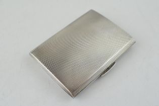 Silver cigarette case, engine turned decoration, 87.7 grams, Birmingham 1950.