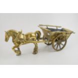 A vintage brass horse and cart. Cart with moving wheels. Weighing over 5KG. Length 46cm, height
