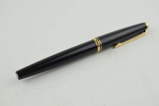 A vintage Montblanc fountain pen with 14k gold nib made in W Germany. Length 13cm. In good