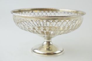 Silver pedestal bowl, London 1915, ornate decoration, 104.7 grams, 14cm diameter.