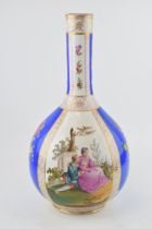 Augustus Rex, a large porcelain onion shaped vase decorated with floral sprays and romantically