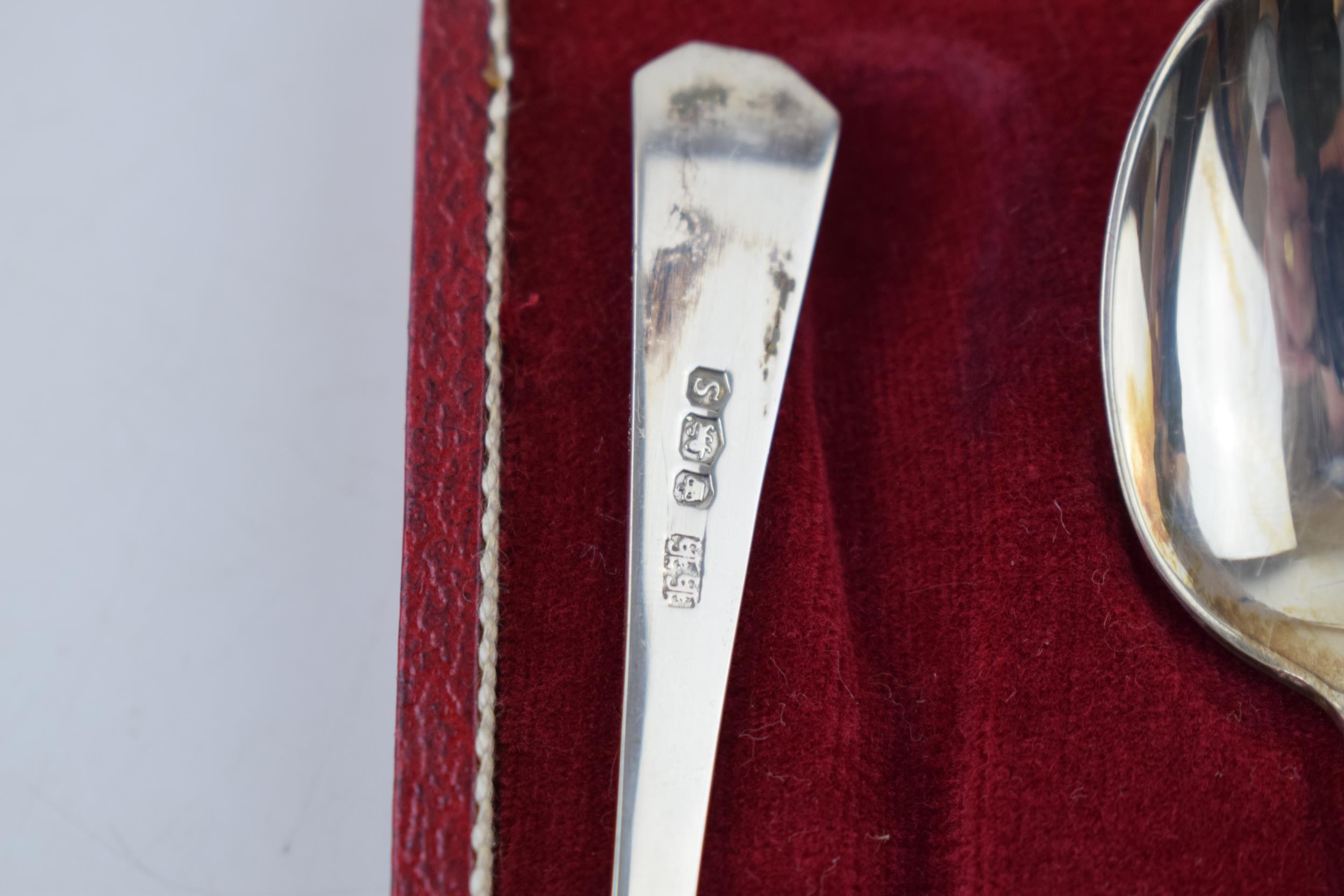 A boxed set of silver spoons hallmarked Sheffield 1935. In red velvet lined case. Weight 72 grams. - Image 3 of 3