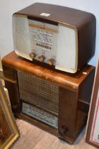 Two vintage valve radios to include a bakelite example and another in a wooden case. (2)