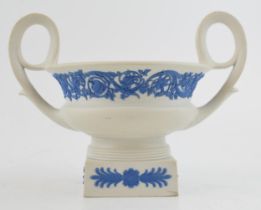 An early 19th century Wedgwood sprig moulded jasperware two-handled vessel in the classical