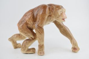 A large Melba Ware figure of a Chimpanzee, 1960s, 40cm long. In good condition with no obvious