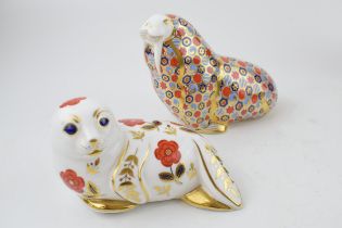Two Royal Crown Derby paperweights, Walrus, 10.5cm high, date code for 1991 (LIV), decorated In a