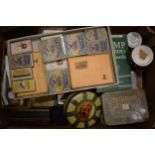 A good collection of vintage stamps, cigarette cards, cigarette packets, tins and other ephemera. (