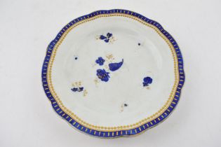 A late 18th century Caughley porcelain Salopian Sprigs pattern plate, c. 1780-1800. Impressed