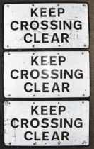 Three Railway "KEEP CROSSING CLEAR" signs. Reflective backing with black text. 67cm x 38cm. (3) In