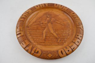 A mid-20th century carved ‘Give Us This Day Our Daily Bread’ German bread board, c. 1940s. Paper