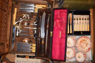 A carving set by J. G. Graves of Sheffield in original velvet lined box. Together with a canteen