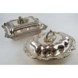 A good quality pair of silver plated entree dishes, with ornate decoration, one by Walker and