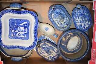 A group of 19th century blue and white transfer printed Willow pattern wares, to include sauce