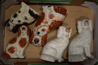 A collection of ceramics to include two pair of Staffordshire Dogs and another single dog. Generally