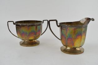 Silver sugar bowl and milk jug in an Art Deco style, hallmarked Sheffield 1930 and 1931. Height 10.