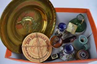 A collection of brewery and spirits related items to include a brass advertising tray for the