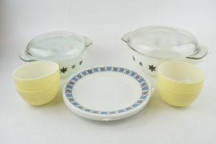 A collection of vintage PYREX glass mid-century kitchenalia items to include two lidded cooking