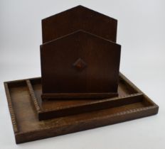 A trio of wooden items to include a magazine rack and 2 graduated serving trays, largest 50 x