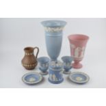 A collection of Wedgwood Jasperware and Queensware items to include a Queensware vase height 27cm. A