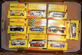 A collection of boxed toy cars. Maisto Sports Cars. (10) In good boxed NOS condition.